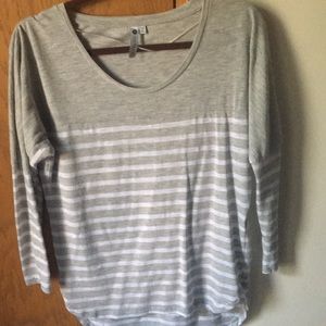 Gray and white striped shirt.